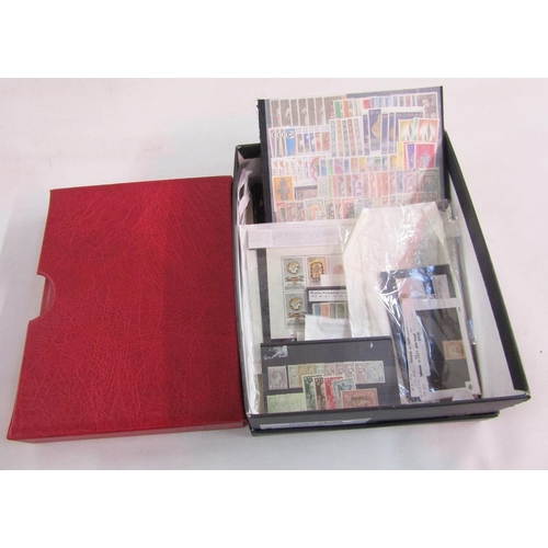 60 - World stamps: Boxed accumulation including red sleeved Lindner album with stock-cards, packets, sing... 