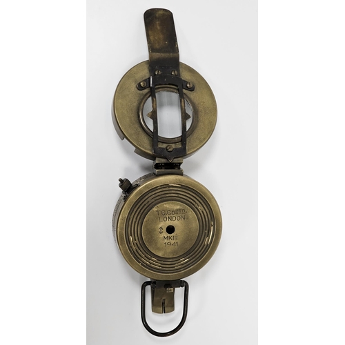 109C - T.G. Co. Ltd (London) brass WWII military compass MKIII, stamped 1941, approx.7.2cm diam.