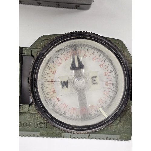 109H - German 'Original Bezard' 1940s pocket compass in military style case and a U.S. military issue magne... 