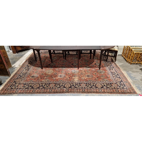 1201 - Eastern salmon ground carpet with floral field, mutiple floral borders, 322cm x 266cm