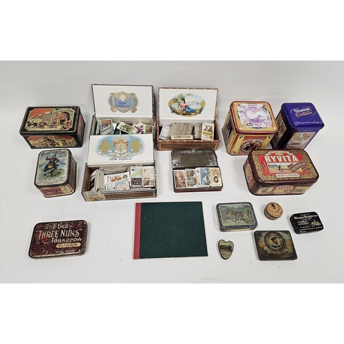 132 - Collection of vintage tins and cigar boxes containing assorted cigarette cards including Wills, John... 