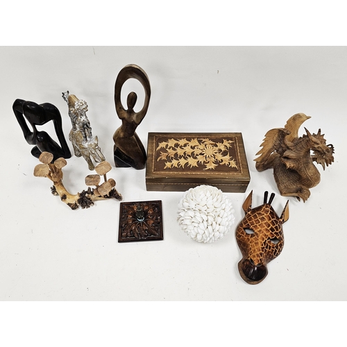 134 - Quantity of carved hardwood statues, sculptures of birds, mushrooms and animals, a set of three grad... 