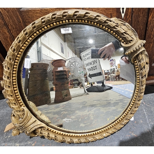 137 - 19th century circular mirror within a gilt painted gesso frame with scrolling and bead decoration, 6... 