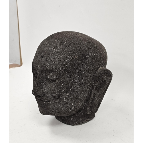 139 - Large carved lava stone Buddha head, 33cm high