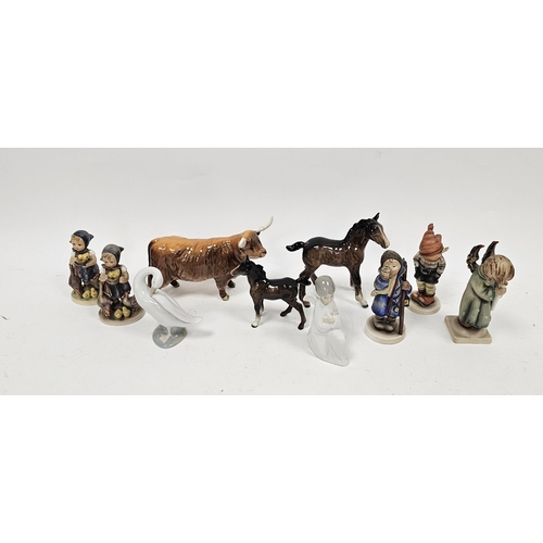 26 - Five Goebel figures of children, a Lladro figure of a swan, a Nao figure of an angel, a Beswick pott... 