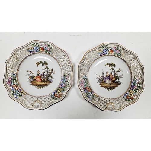 40 - Two Dresden Meissen style pierced dessert plates, late 19th century, blue crossed swords marks, each... 