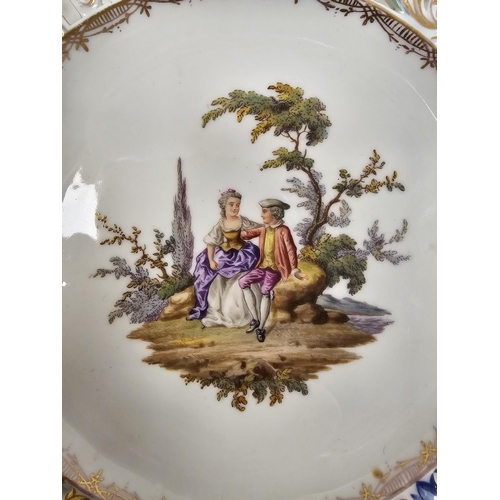 40 - Two Dresden Meissen style pierced dessert plates, late 19th century, blue crossed swords marks, each... 