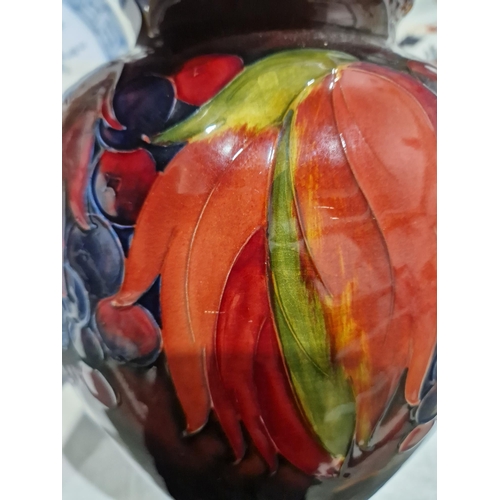 50A - LOT WITHDRAWN - Moorcroft 'Leaf and Berry' pattern oviform vase, 20th century, painted and impressed... 