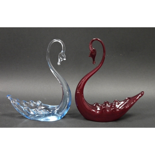 78 - Two Whitefriars glass models of swans, in ruby and pale blue tints, 20.5cm high (2)