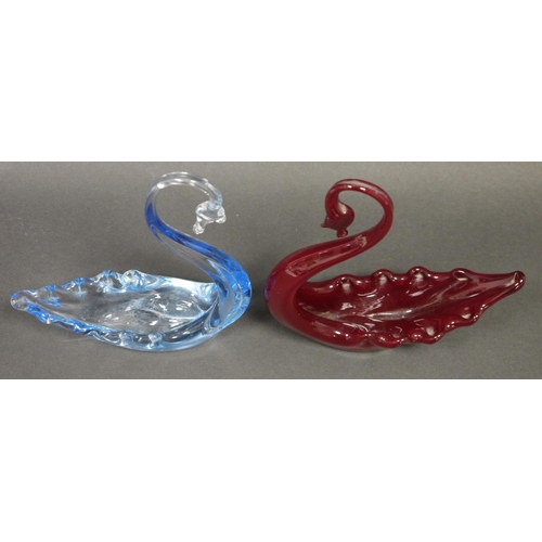 78 - Two Whitefriars glass models of swans, in ruby and pale blue tints, 20.5cm high (2)