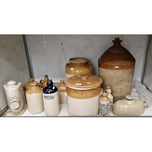 123 - Various stone ware flagons, kilner jars, bottles, footwarmers , many with stamped names - W B Turney... 