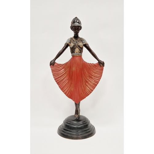 132 - Art Deco figure of a dancing girl,  patinated and painted brass, possibly American, her bodice elabo... 