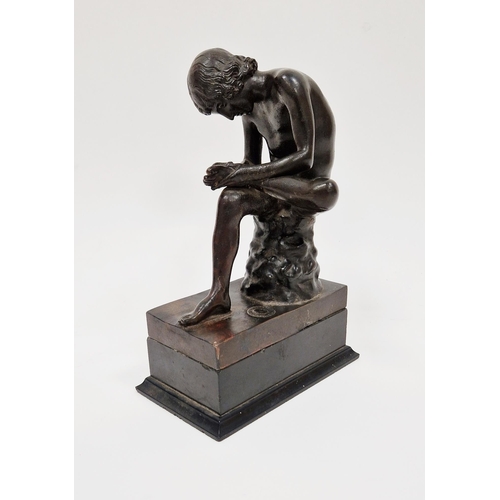 150 - Bronze figure of a seated young nude male , looking at the sole of his left foot, blindstamp foundry... 