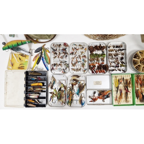 177 - Collection of boxed fishing flies, a Hardy's (Alnwick) MKII fishing reel, assorted lures, bags and o... 