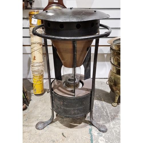 179 - Early 20th century iron housed conservatory heater/burner with Hicks marked burner, with pierced har... 