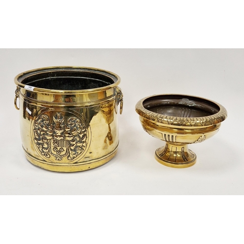 184 - Edwardian embossed brass coal scuttle of cylindrical form, decorated with a mantled armorial, with l... 