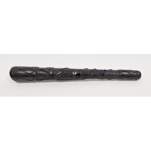 212 - Late 19th century Irish bog oak carved salmon priest, carved with shamrocks and a harp, 43cm long