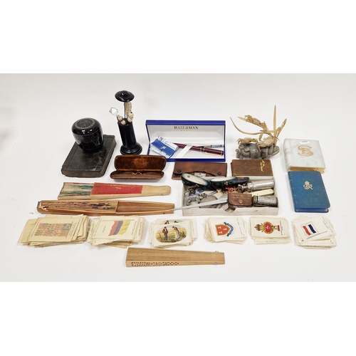 214 - Boxed Waterman fountain pen, a Russian painted lacquered brooch, various commemorative coins, a coll... 