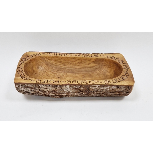 221 - Carved oak fruit bowl by Maxim Hastings, signed to base, the the form of a hollowed branch, inscribe... 