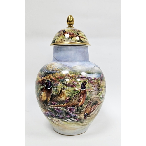 24 - Contemporary bone china oviform vase with domed cover, painted by Wendy Ann White, printed scroll an... 