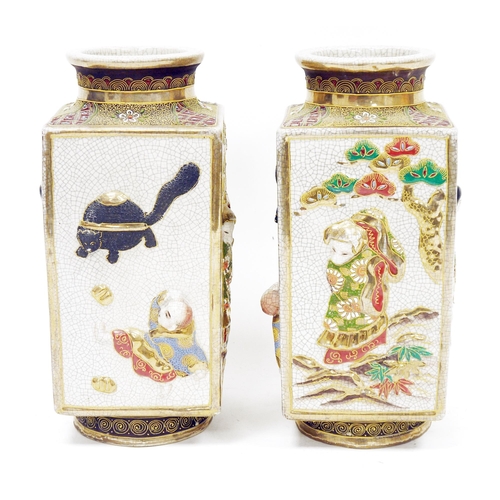 263 - Pair of Japanese Satsuma square-section vases, early 20th century, each moulded with dancing figures... 