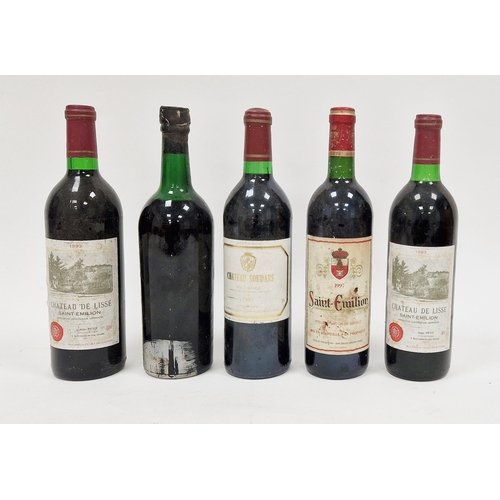 309 - Four bottles of red wine including Chateau Soudars haut-medoc 1992, 1997 St Emillion and two bottles... 