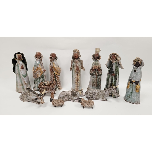 37 - Ashwell pottery tin glazed earthenware nativity set including the wise men, cattle and crib, a Seven... 