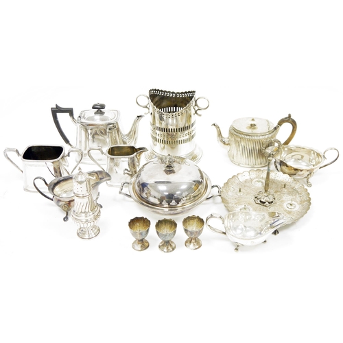 405 - Collection of plated ware, including a three piece tea set; cream and milk jugs; entree dish and cov... 