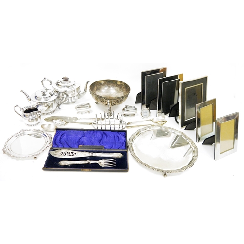 423 - Silver plated salver raised on claw and ball feet, a smaller silver plated card tray, various silver... 