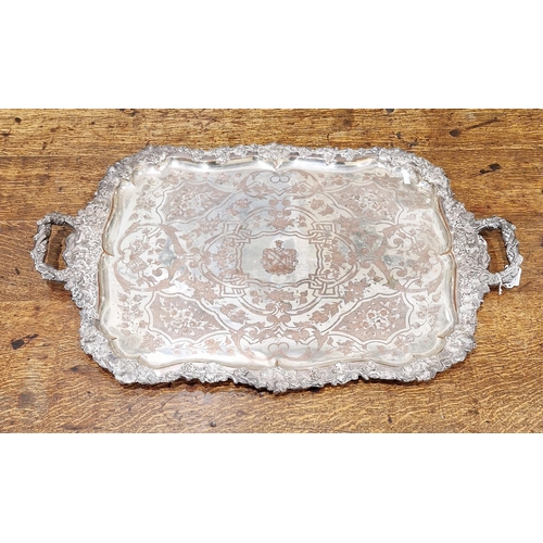 432 - Large Sheffield silver-plated two-handled tray, the border cast with fruiting vine, engraved with a ... 