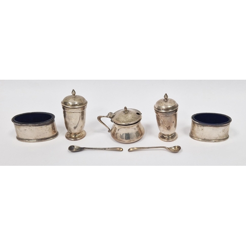 437A - Matched silver condiment set, pair pepperettes, pair oval salts with blue glass liners (mustard line... 