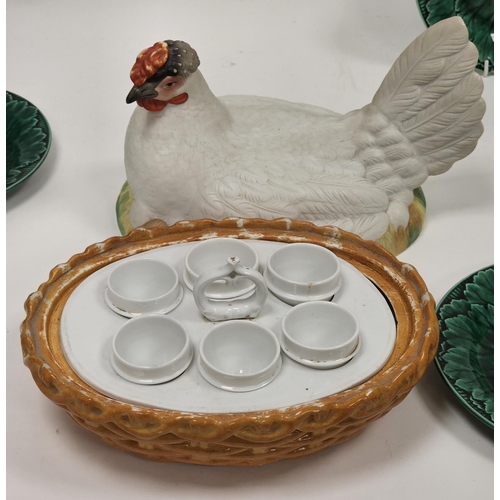 44 - Staffordshire-style hen on nest egg tureen fitted with egg stand and six egg cups to interior, paint... 