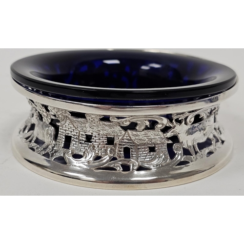 442A - Early 20th century miniature silver dish ring of typical form decorated figures, buildings, animals ... 