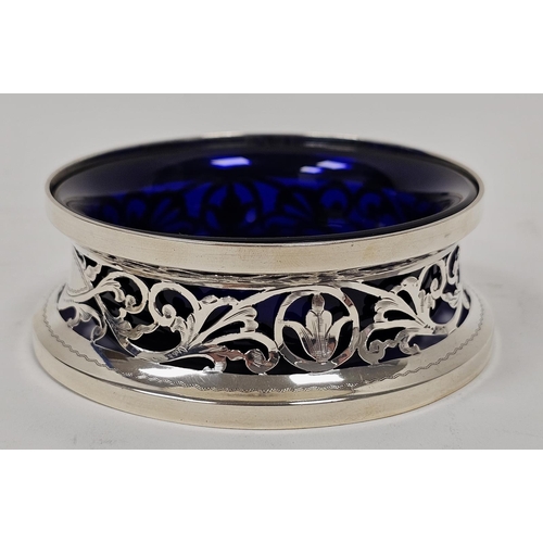 442 - George V silver miniature dish ring of typical waisted form and pierced with foliate scrolls and two... 