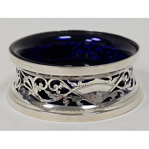 442 - George V silver miniature dish ring of typical waisted form and pierced with foliate scrolls and two... 