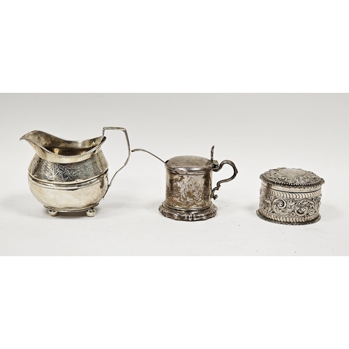 447 - George III silver cream jug, marks rubbed, of shaped oval form engraved with a band of flowers, on f... 