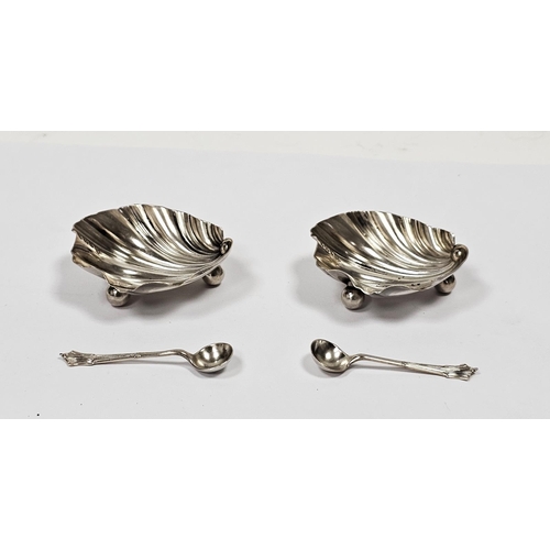 458 - Pair late Victorian silver salt cellars, each shell-shaped and raised on three ball feet and a match... 