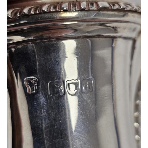 462 - Late Victorian crested silver hot water jug, baluster-shaped and having high domed lid and spirally ... 