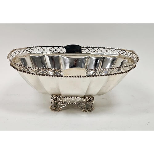 464 - Edwardian silver fruit bowl, rounded oblong and having quatrefoil pierced and beaded border rim, pan... 