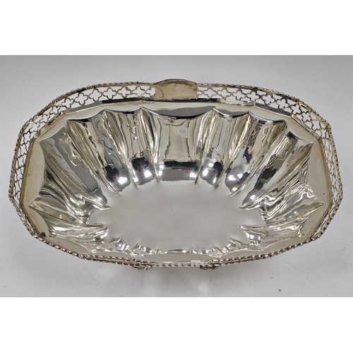 464 - Edwardian silver fruit bowl, rounded oblong and having quatrefoil pierced and beaded border rim, pan... 