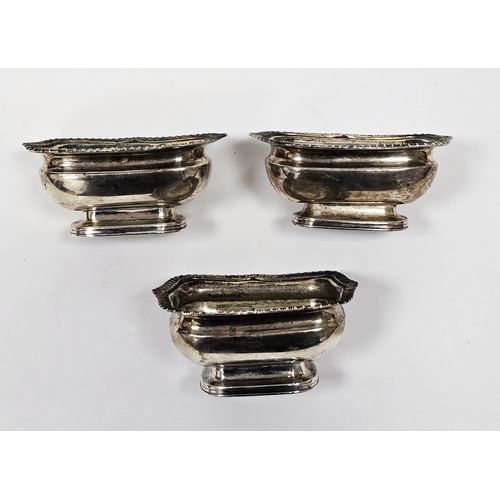 476 - Set of three George III silver salts, each rectangular with serpentine gadrooned everted rim on step... 