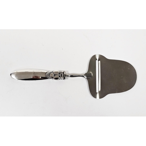 478 - Silver handled cheese parer by Georg Jensen, with import marks for London 1961, the silver handle in... 