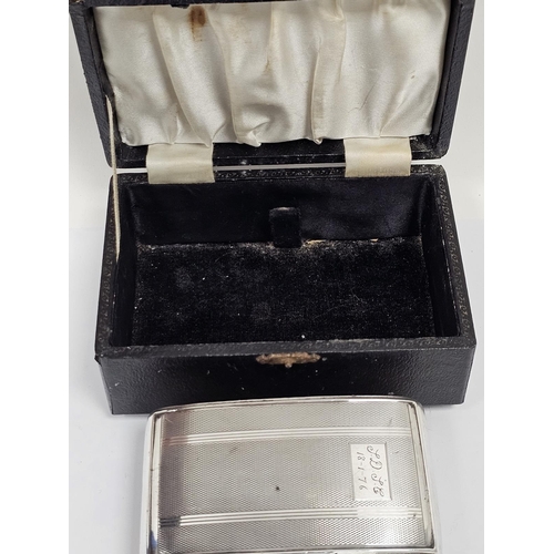 485 - Elizabeth II silver backed engine turned clothes brush, in leather box, engraved with initials and t... 