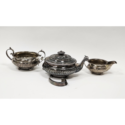 516 - George IV silver tea service, probably Simon Levy, Exeter 1825, comprising teapot, sugar bowl and mi... 