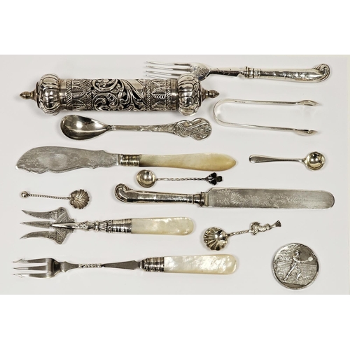 525 - Edwardian bread fork with engraved silver tines and mother-of-pearl handle, a silver-coloured medal ... 