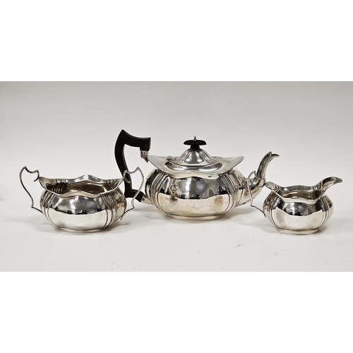 529 - George V three-piece silver teaset comprising teapot, twin-handled sugar bowl and milk jug, Birmingh... 