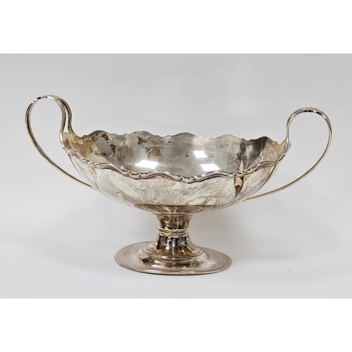 533 - George V silver twin-handled boat-shaped fruit bowl with wavy rim, on oval pedestal base, Sheffield ... 