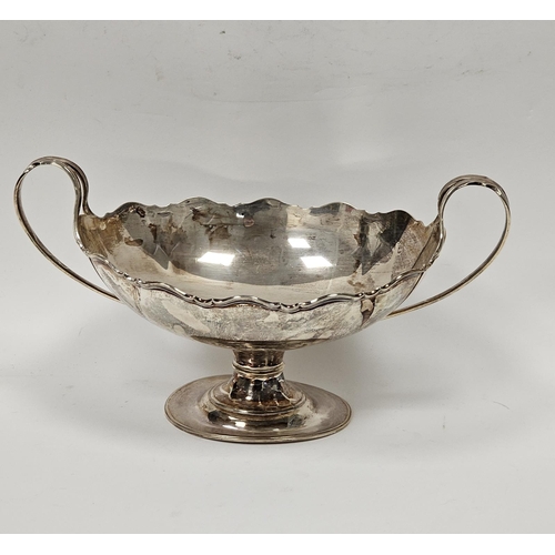 533 - George V silver twin-handled boat-shaped fruit bowl with wavy rim, on oval pedestal base, Sheffield ... 