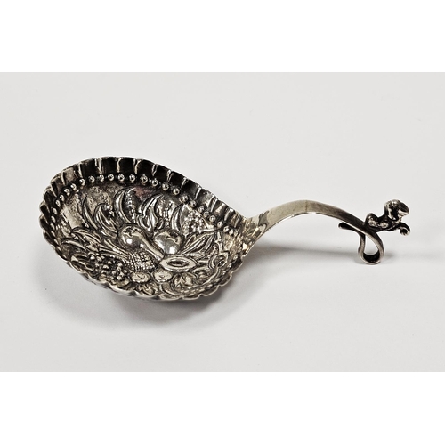 541 - 19th century silver caddy spoon, hammered and embossed bowl depicting various fruits including a pin... 