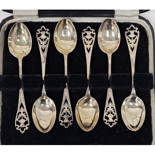 560 - Set of six silver teaspoons by Francis Howard Ltd, Sheffield 1955, the terminals with pierced thistl... 